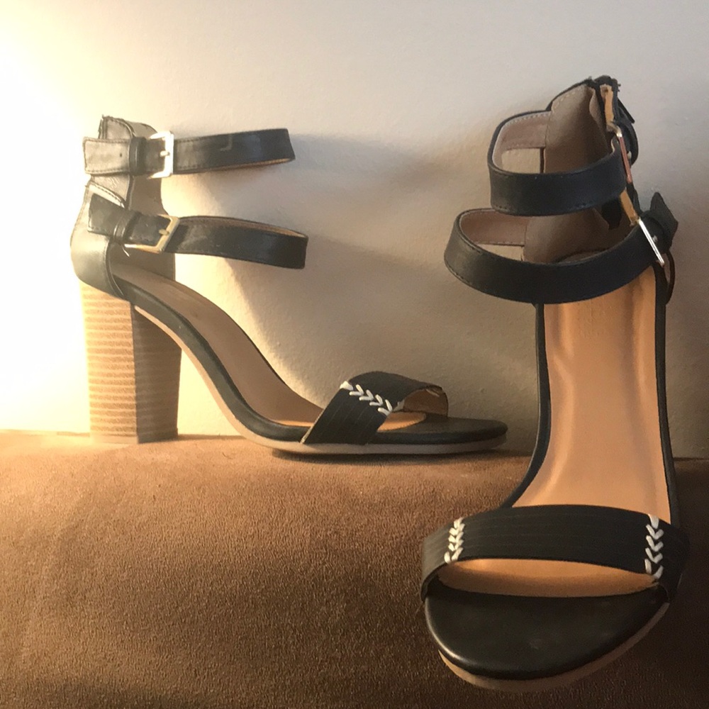 Black heeled sandals.